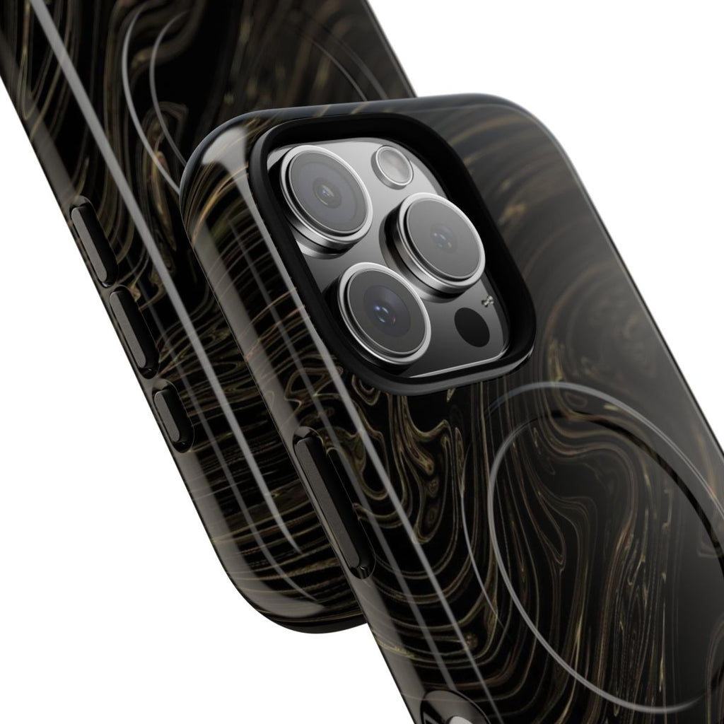 Black & Gold Swirl MagSafe-compatible tough case on iPhone 16 Pro, glossy finish (close-up)