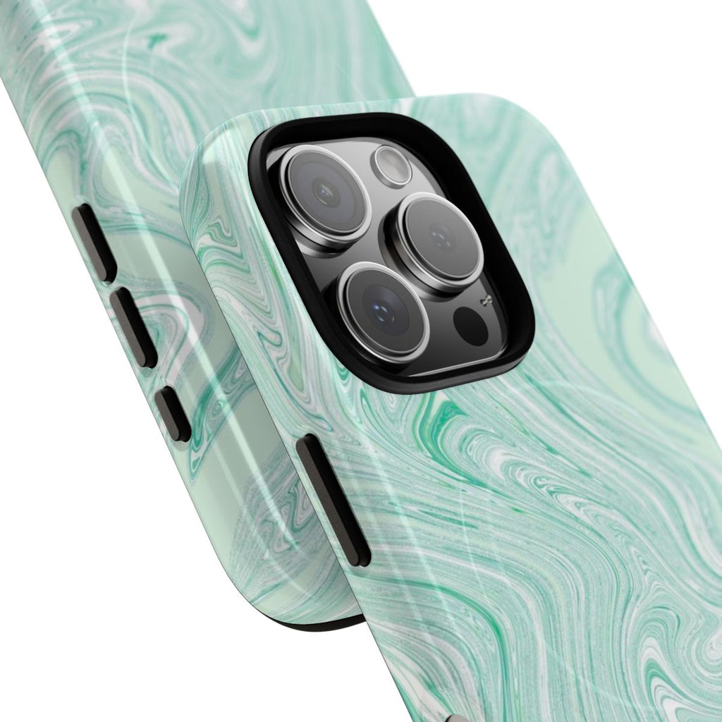 Mint Swirl MagSafe-compatible tough case on iPhone 16 Pro, glossy finish (close-up)